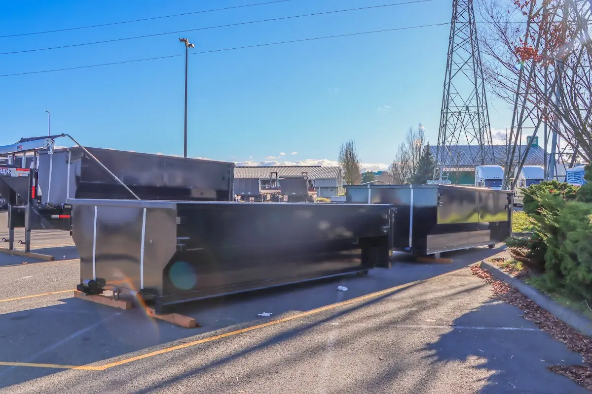 Roll-off dumpster ready for waste disposal at job site for Commercial Dumpster Rental in Derby